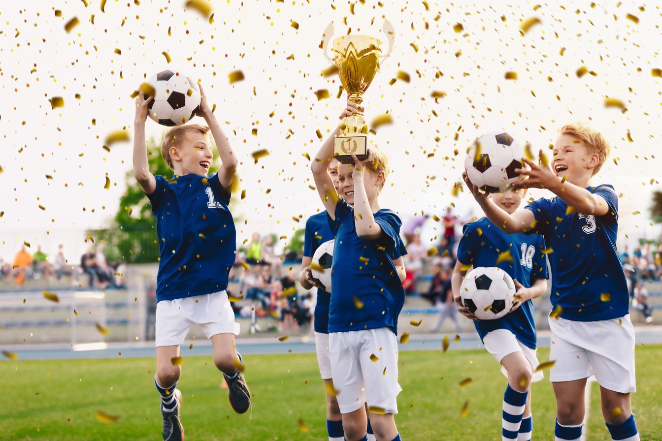 Children Celebrating Their Soccer Championship